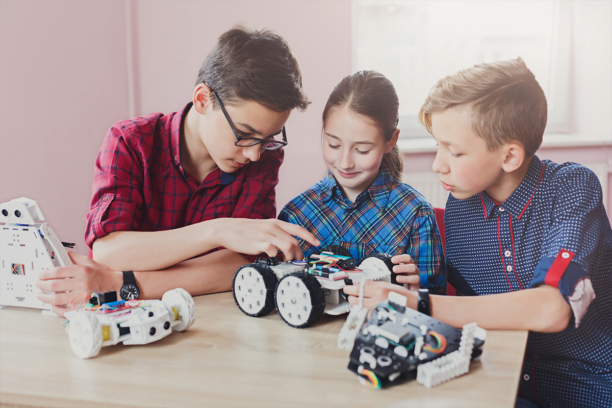 Children creating robots at school stem education